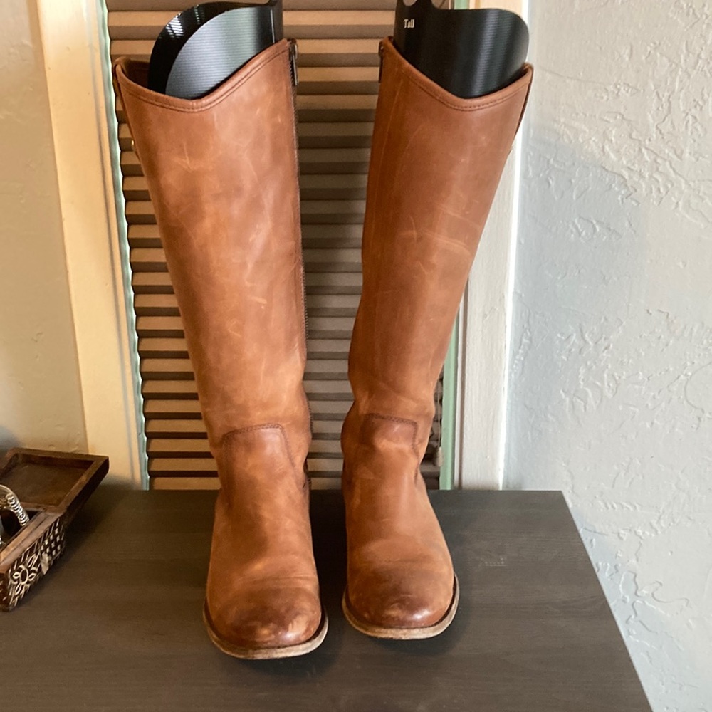 Frye boots slight scratches caused from a friends dog